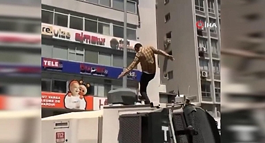İzmir mitingi öncesi TOMA'nın üzerine çıkmıştı! Gözaltına alındı
