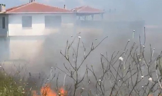 Buğday tarlasında çıkan yangın evlere sıçramadan kontrol altına alındı